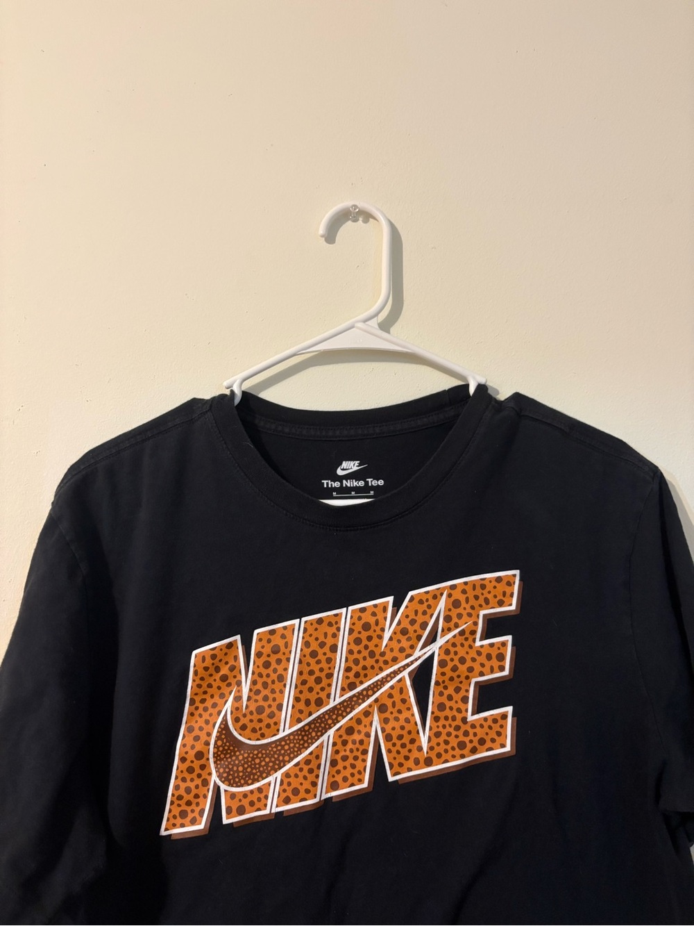 Nike Black Graphic Tee with Orange basketball Logo